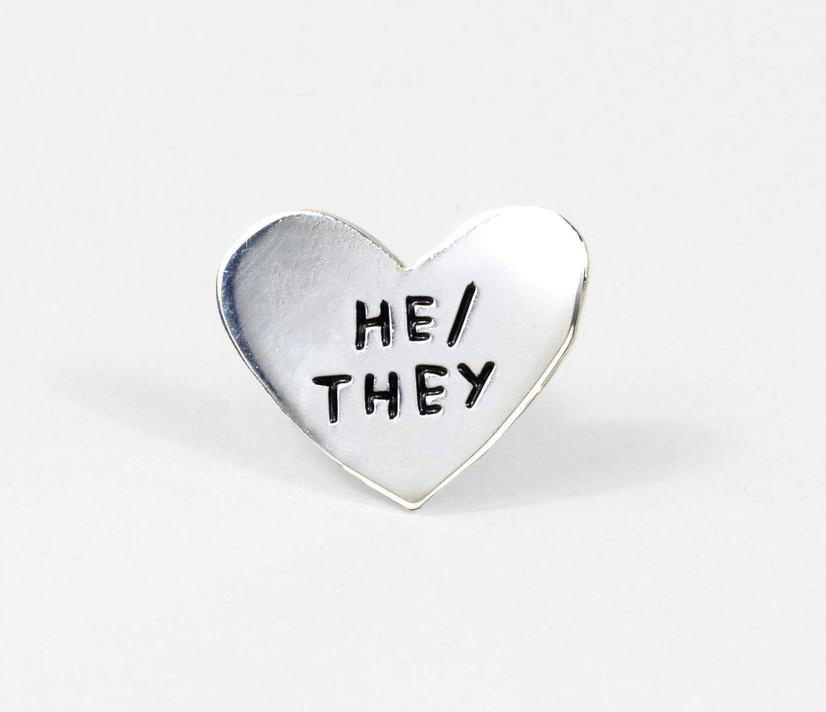 Pin-Pronoun: He/They